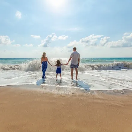 A family on the shoreline