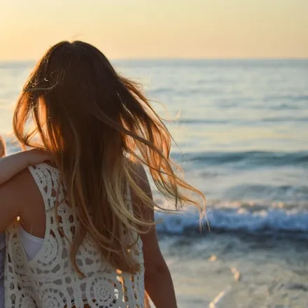 Someone looking out to sea
